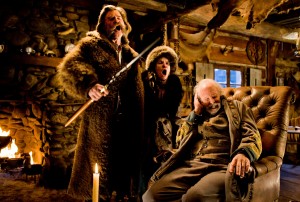 (L-R) KURT RUSSELL, JENNIFER JASON LEIGH, and BRUCE DERN star in THE HATEFUL EIGHT. ©The Weinstein Company. CR: Andrew Cooper.