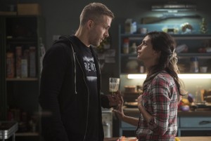 Wade Wilson (Ryan Reyonlds) and new squeeze Vanessa (Morena Baccarin) trade some pointed barbs, in DEADPOOL ©20th Century Fox / Marvel. CR: Joe Lederer.