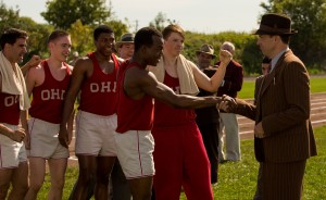 (l-r) Stephan James (center) stars as Jesse Owens and Jason Sudeikis (right) stars as Larry Snyder in Stephen Hopkins’ RACE, ©Focus Features. CR: Thibault Grabherr.