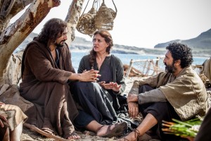 Jesus (Cliff Curtis) with Mary (Maria Botto) and James (Selva Rasalingam) and his other apostles on the shores of the Sea of Galilee in Columbia Picutres' RISEN. ©CTMG. CR: Rosie Collins.