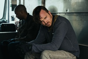 (l-r) Chiwetel Ejiofo and Aaron Paul star in TRIPLE 9. ©Open Road Films. CR: Bob Mahoney.