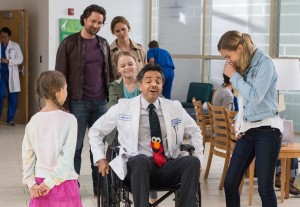 Dr. Nurko (EUGENIO DERBEZ) rides in the wheel chair as Anna (KYLIE ROGERS) pushes while Kevin (MARTIN HENDERSON), Christy (JENNIFER GARNER), Abbie (BRIGHTON SHARBINO) and Adelynn (COURTNEY FANSLER) watch in Columbia Pictures' MIRACLES FROM HEAVEN. ©CTMG. CR: Chuck Zlotnick.