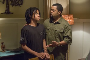 (l-r) MIchael Rainey Jr. as Jalen and Ice Cube as Calvin in BARBERSHOP: THE NEXT CUT. ©Warner Bros. Entertainment/MGM Pictures. CR: Chuck Zlotnick.