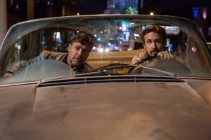 (l-r) Russell Crowe as Jackson Healy and Ryan Gosling as Holland March in THE NICE GUYS. ©Warner Bros. Entertainment. CR: Daniel McFadden.