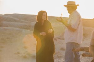 (l to r) Ayelet Zurer and Director Rodrigo García work out a scene on the set of their new film LAST DAYS IN THE DESERT. ©Broad Green Pictures release. CR: Gilles Mingasson / Broad Green Pictures