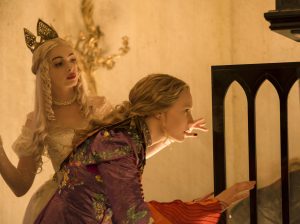 (l-r) Anne Hathaway is the White Queen and Mia Wasikowska is Alice in Disney's ALICE THROUGH THE LOOKING GLASS. ©Disney Enterprises. CR: Peter Mountain.