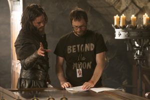 (L to R) TRAVIS FIMMEL and director DUNCAN JONES on the set of WARCRAFT. ©Universal Pictures / Legendary Pictures / ILM. CR: Doane Gregory.