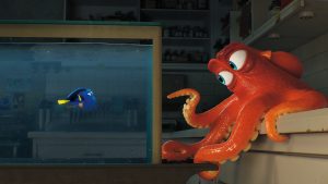 (l-r) Dory (voice of Ellen DeGeneres), encounters an array of new—and old—acquaintances, including a cantankerous octopus named Hank (voice of Ed O'Neill) in FINDING DORY. ©Disney-Pixar.