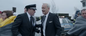 Center right) TOM HANKS as Chesley "Sully" Sullenberger in Warner Bros. Pictures' and Village Roadshow Pictures' drama "SULLY." ©Warner Bros. Entertainment.