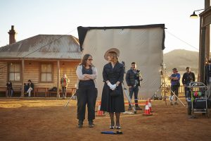 Director Jocelyn Moorhouse (left) and Kate Winslet (right) on the set of THE DRESSMAKER. ©Broad Green Pictures / Amazon Studios. CR: Ben King.
