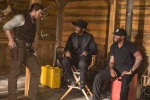 Chris Pratt, Denzel Washington and Director Antoine Fuqua on the set of Metro-Goldwyn-Mayer Pictures and Columbia Pictures' THE MAGNIFICENT SEVEN. ©MGM / Columbia Pictures. CR: Sam Emerson.
