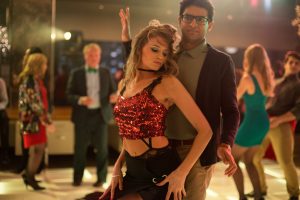 Karan Soni as Nate and Abbey Lee as Savannah in OFFICE CHRISTMAS PARTY. ©Paramount Pictures. CR: Glen Wilson.