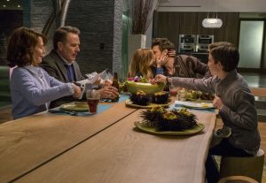 Ned (Bryan Cranston 2nd left) isn’t happy when his future son-in-law Laird (James Franco, 2nd right) makes out with his daughter Stephanie (Zoey Deutch 3rd from left) at the dinner table, as Barb (Megan Mullally ,left) and Scotty (Griffin Gluck, right) pretend not to notice in WHY HIM? ©20th Century Fox. CR:. Scott Garfield.