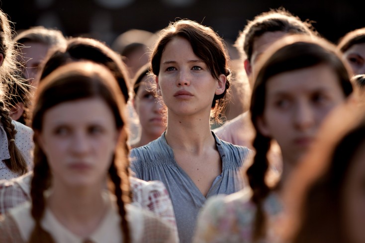 Jennifer Lawrence Steps Up to the Plate for ‘The Hunger Games’ – 4 Photos